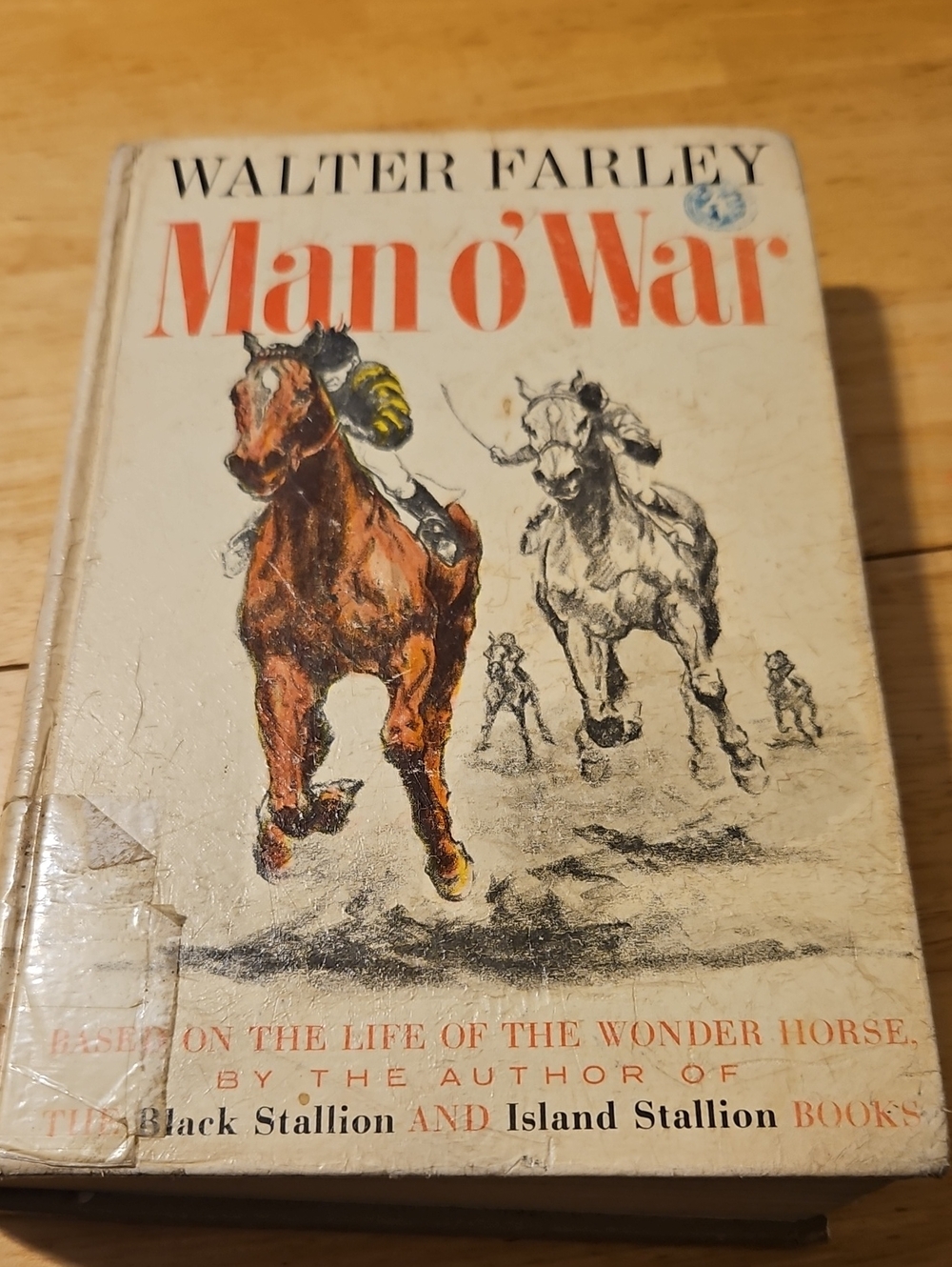 Man o'War Hardcover Book - Cream Cover with Orange Text